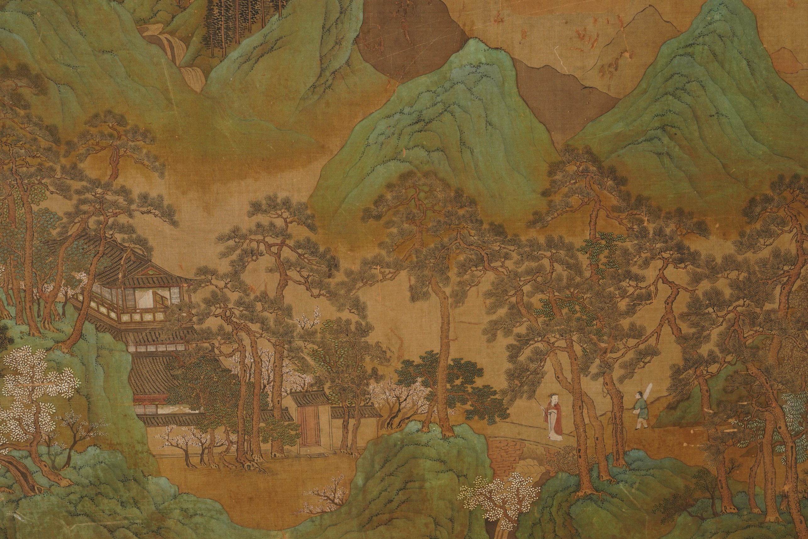 Chinese School , 17th century or earlier, Scholars in a mountainous river landscape scene with pavilions, Ink and colour on silk, incomplete clerical script signature, 54cm x 290cm